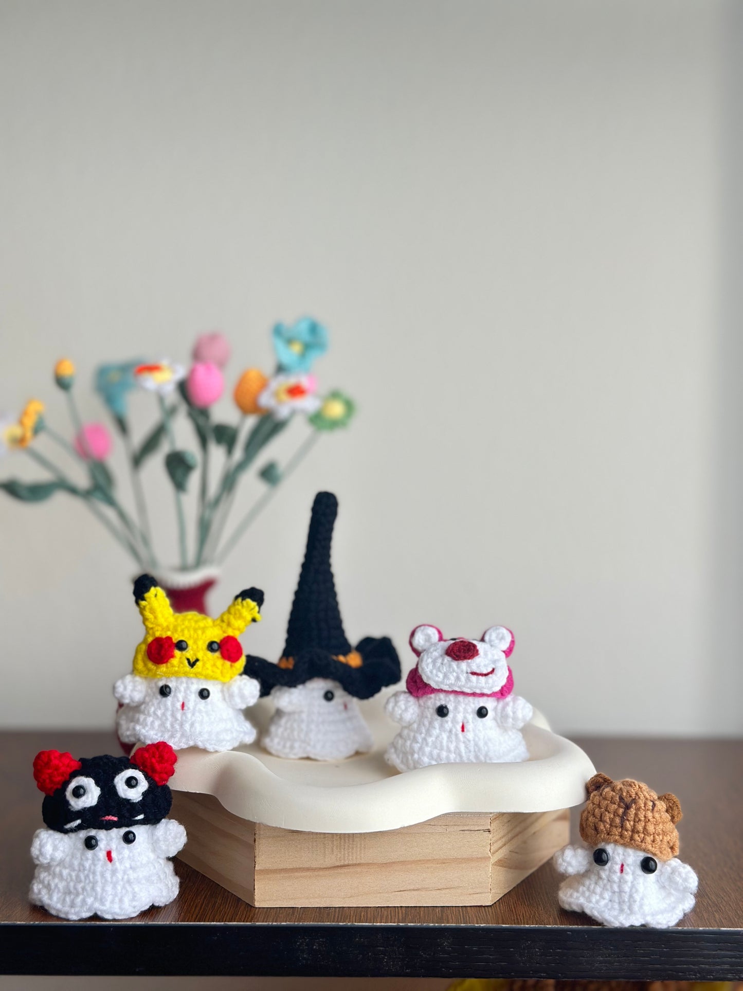 Adorable Crochet Ghost Figures with Themed Hats